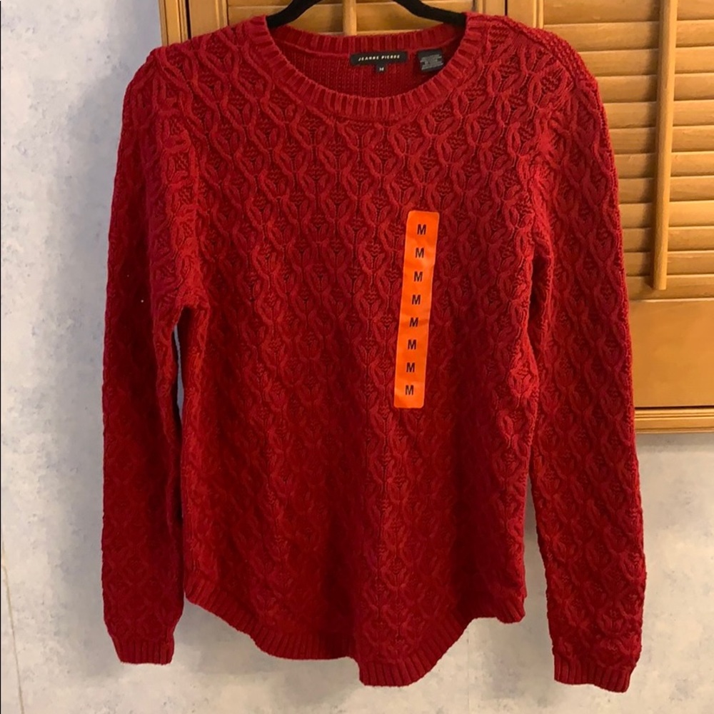 A red size medium Jeanne Pierre sweater